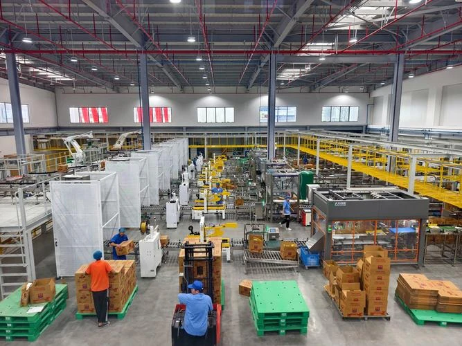 Precision CNC timber cutting and automated frame welding in an audited Chinese furniture factory